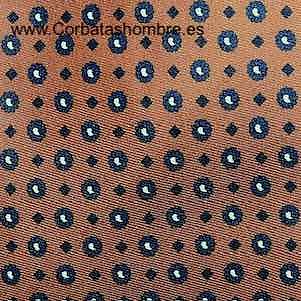 CORBATA ANCHA OCRE CON LUNARES AZUL MARINO ALTERNADOS DE PEQUEÑOS ROMBOS 
