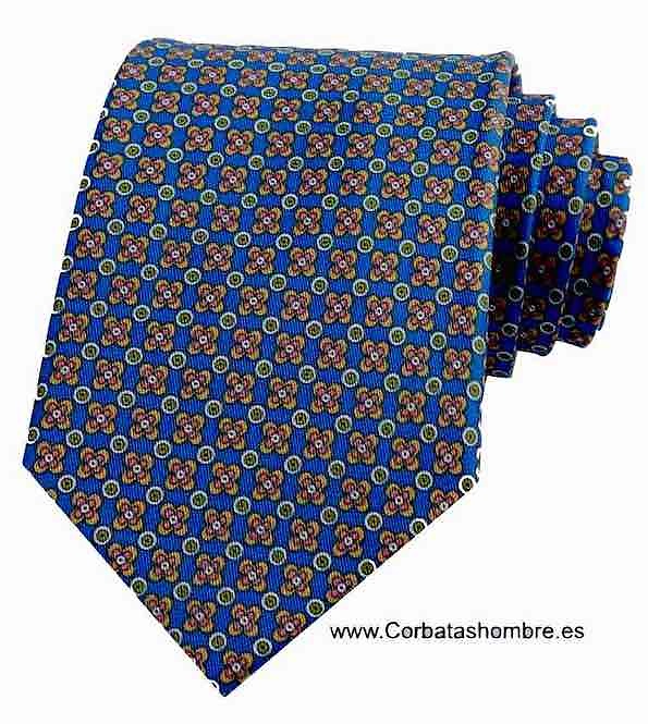 CORBATA AZUL DE FLORECITAS DE CUATRO PETALOS CON CÍRCGULOS 