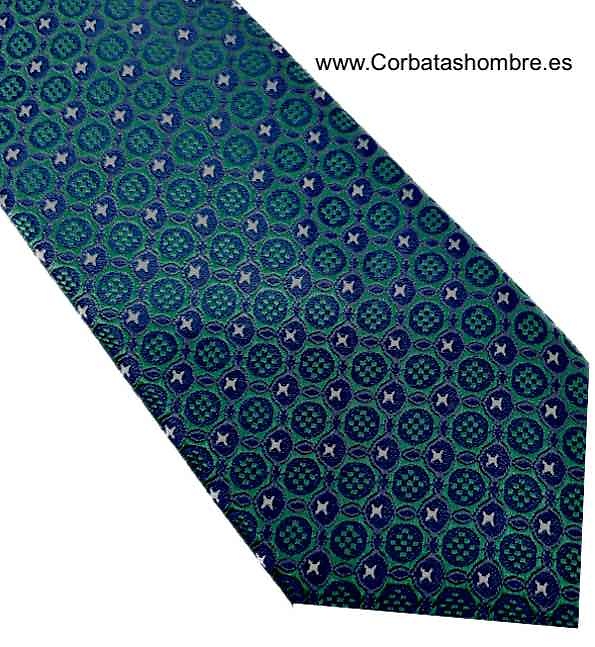 CORBATA ESTRECHA VERDE CON FONDO AZUL MARINO Y ESTRELLAS PEQUEÑAS BLANCAS DE TELA JACQUARD 