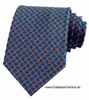 CORBATA AZUL DE FLORECITAS DE CUATRO PETALOS CON CÍRCGULOS