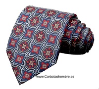 CORBATA  CON DIBUJO DE MOSAICO DE ROSETONES ROJOS ENMARCADOS EN AZUL MARINO