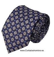 CORBATA DE SEDA AZUL  CON DIBUJO DE FLORES DE OCHO PÉTALOS BLANCOS